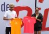 Delhi Half Marathon 2024 race day tees are introduced by Sarabjot Singh and Harmanpreet Kaur.