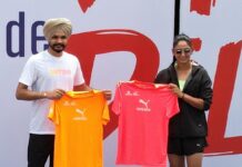 Delhi Half Marathon 2024 race day tees are introduced by Sarabjot Singh and Harmanpreet Kaur.